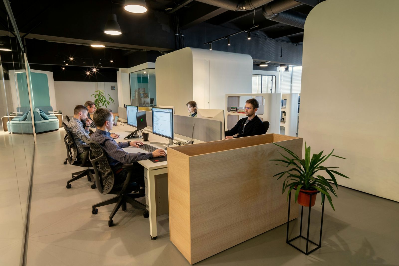 Staff working at their desks in a networked office
